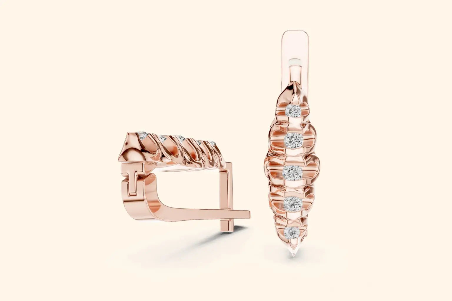 Rose gold hoop earrings with diamond accents on a light beige background