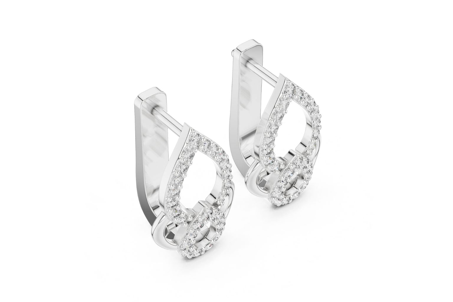 Pair of silver hoop earrings with clear gemstones on a white background