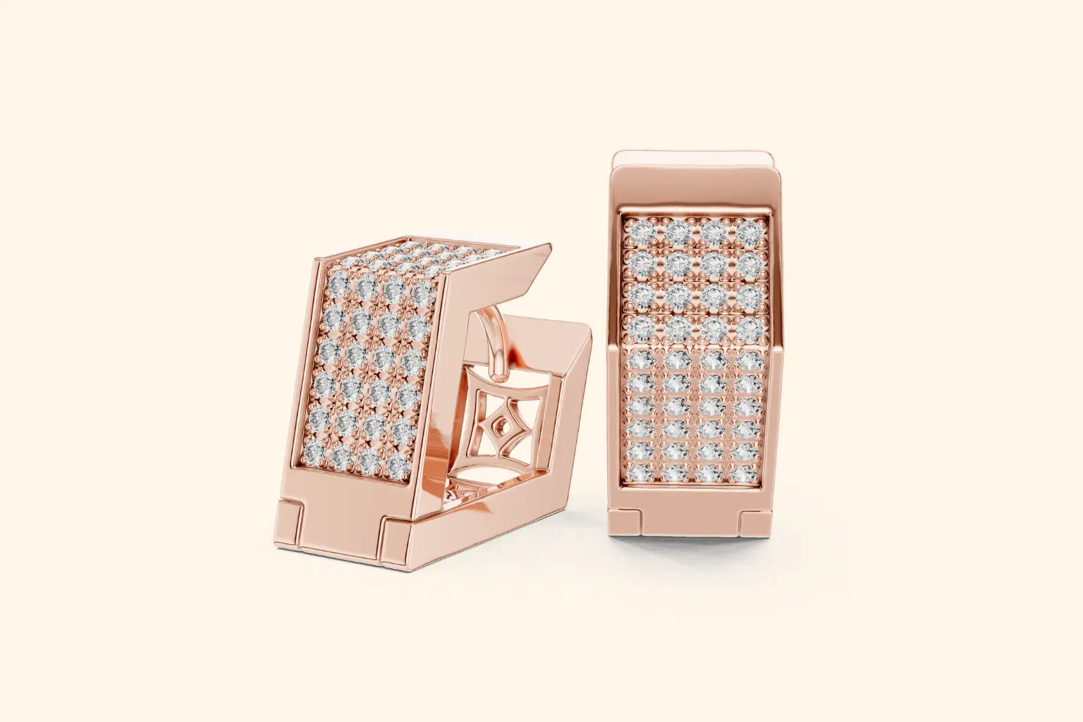 Rose gold earrings with diamond accents on a light beige background