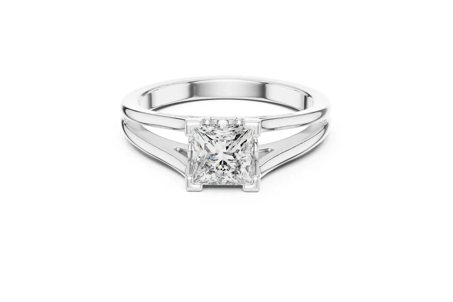 Front view of a silver-colored metal solitaire engagement ring with a radiant-cut diamond set horizontally in a bezel or partial bezel setting, featuring a minimalist split-shank band.