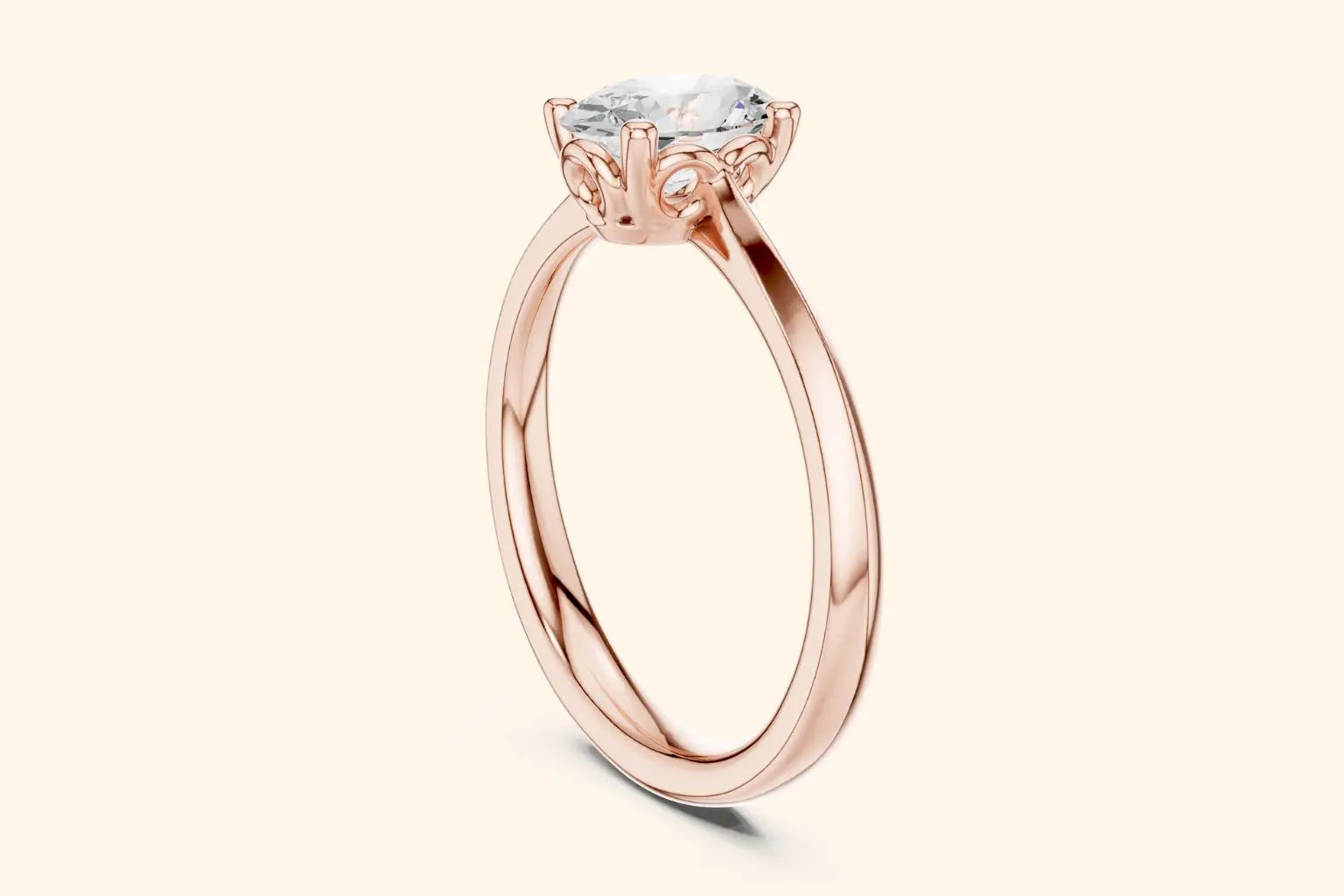A side view of a simple, thin, polished rose gold ring band flowing up to the high-set diamond, highlighting the delicate, scroll-work basket setting.