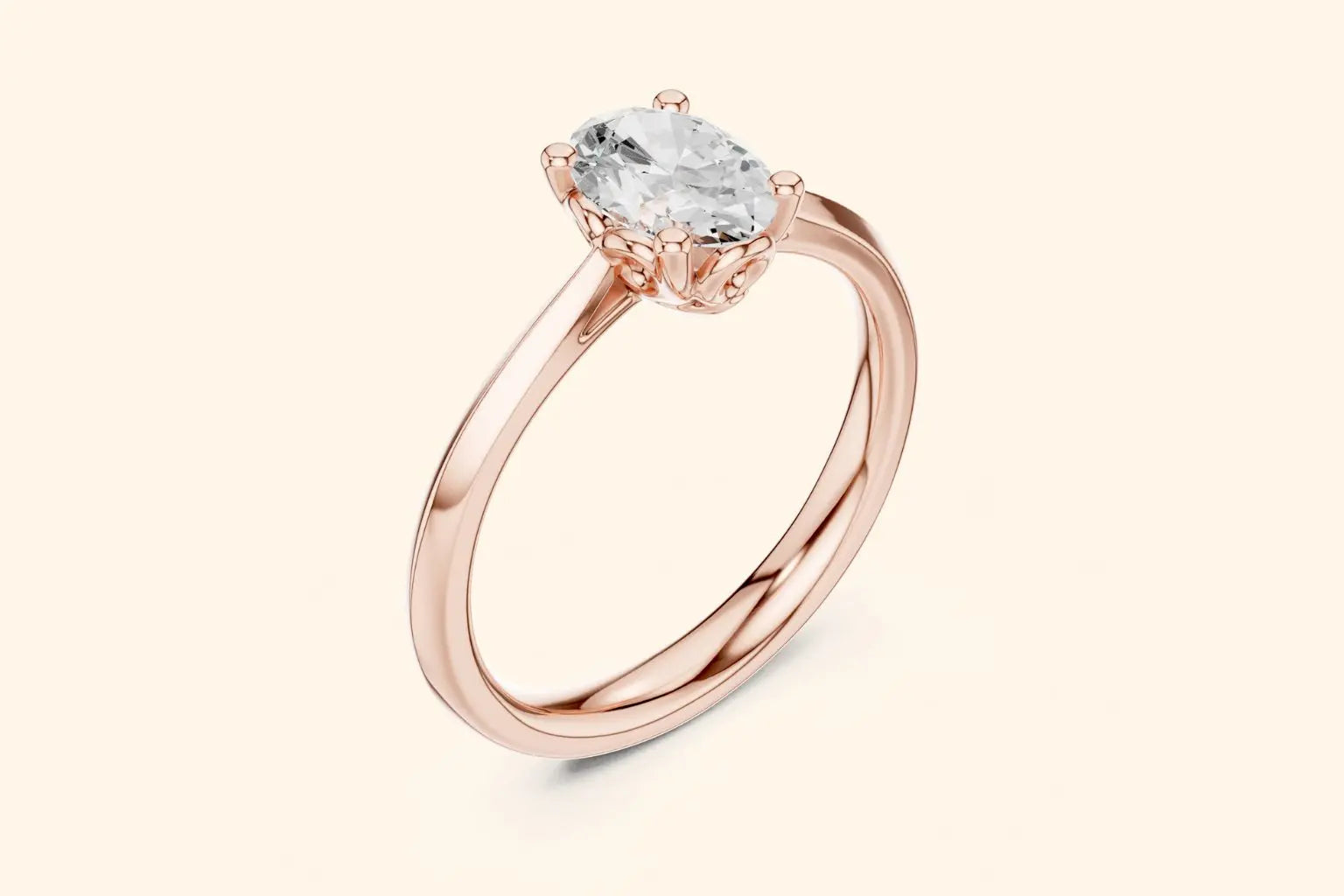 A three-quarter view of a delicate rose gold solitaire ring with a high-set oval diamond, showing the slender band and the intricate, open-work basket setting.