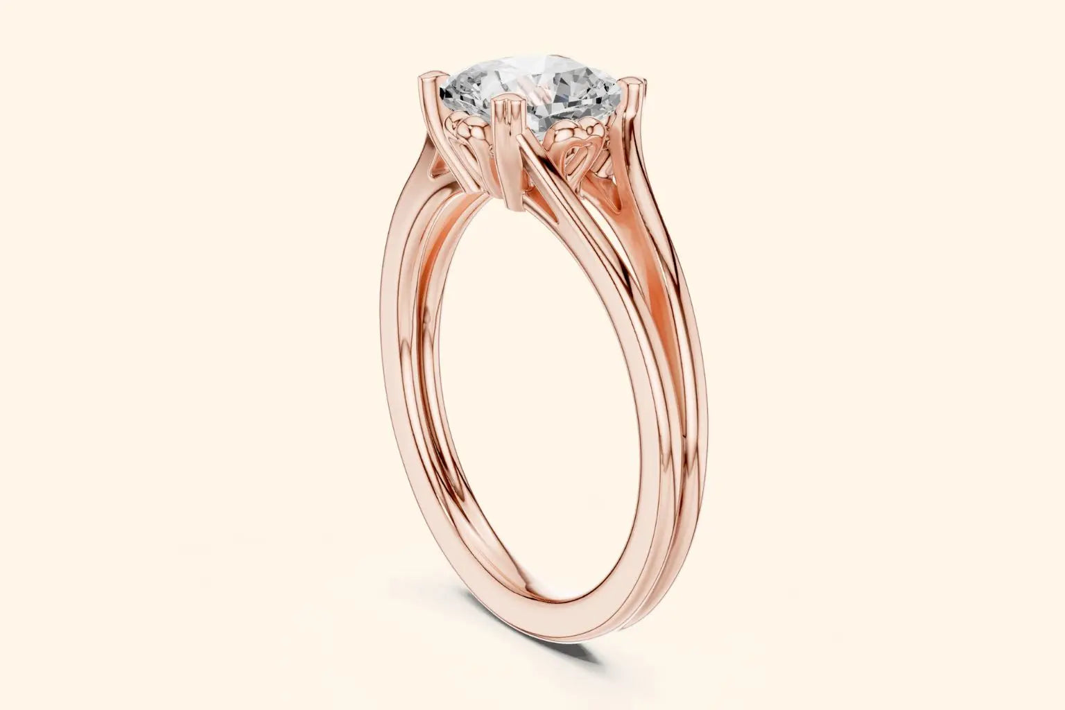Side view of a rose gold solitaire ring, showcasing the open split-shank band and the ornate basket setting holding a round or cushion diamond.