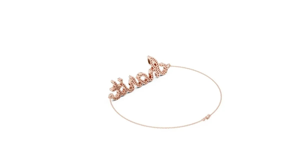 Low-angle view of the back and side of the rose gold script name bracelet, showing the diamond setting details.