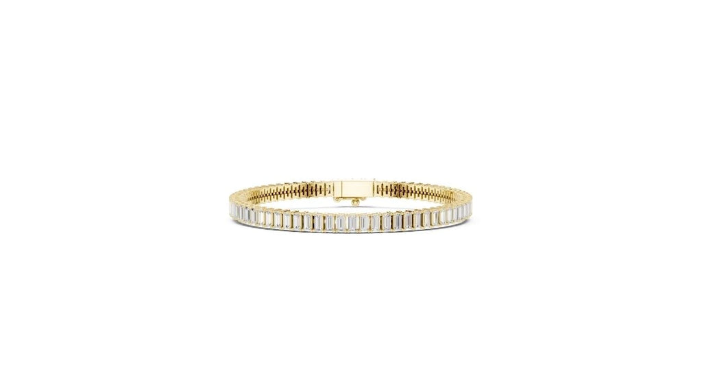 Single-row tapered baguette diamond bracelet in yellow gold, centered on a box clasp.