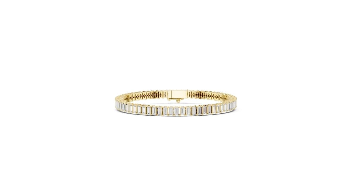 Single-row tapered baguette diamond bracelet in yellow gold, centered on a box clasp.