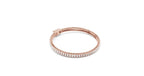 Dual-row tapered baguette diamond bracelet in rose gold with a hidden safety clasp.