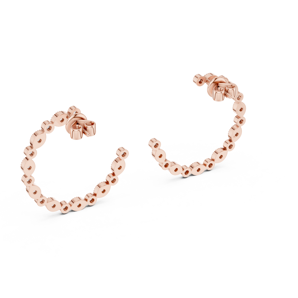 Rose gold hoop earrings on a white background
