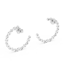 Silver hoop earrings with small round embellishments on a white background