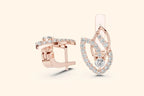 Rose gold diamond earrings with an elegant teardrop design and sparkling round-cut stones.