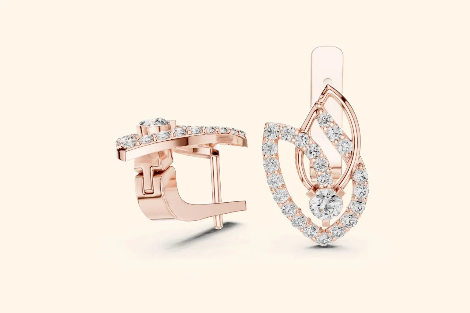 Rose gold diamond earrings with an elegant teardrop design and sparkling round-cut stones.