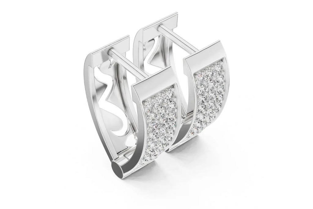 Close-up of two sparkling silver earrings, each featuring a rectangular surface completely covered in pave-set round diamonds.