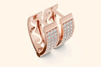Pair of rose gold lever-back earrings with a rectangular pave diamond front.