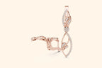 Rose gold earring with diamond accents on a light beige background