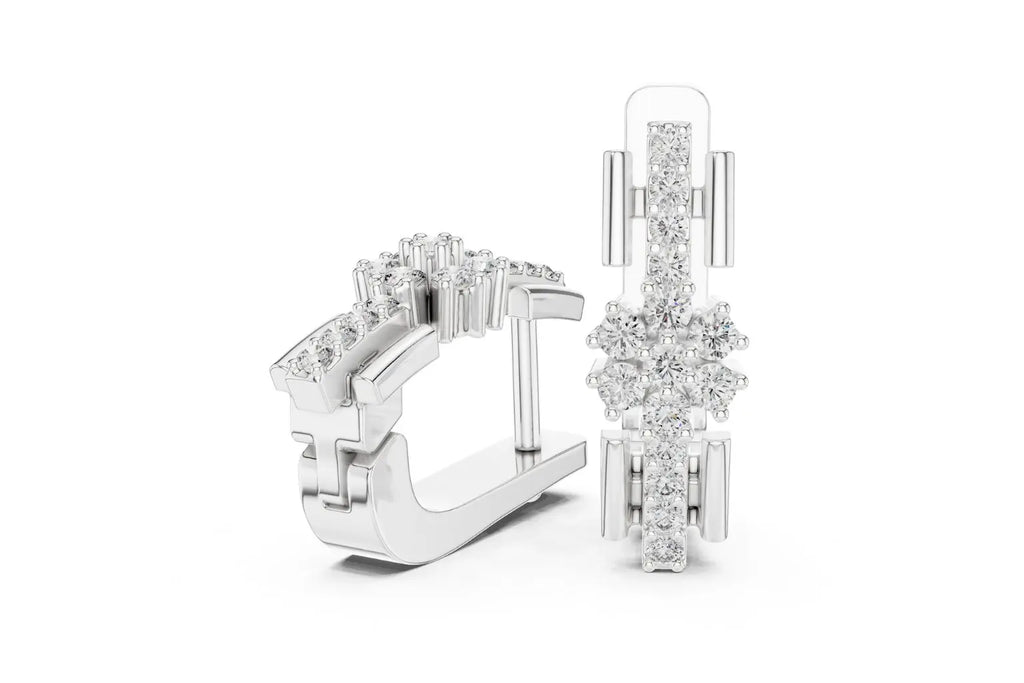 Pair of silver hoop earrings with clear gemstones on a white background