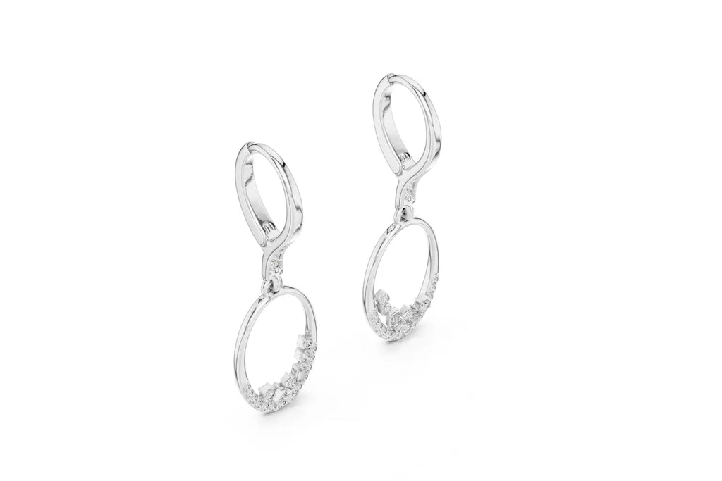 Pair of silver earrings on a white background