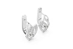 Pair of silver earrings with clear gemstones on a white background