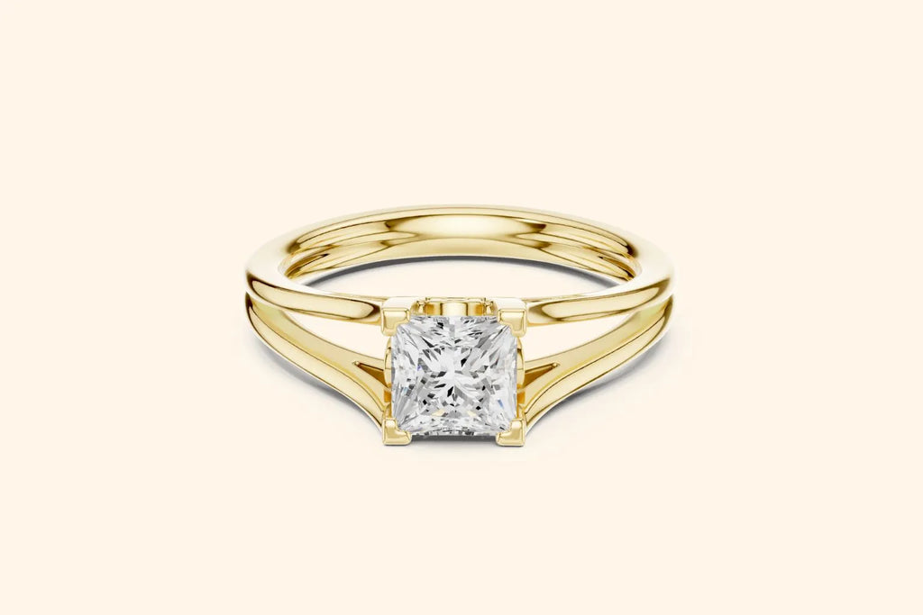 Princess cut lab grown diamond solitaire ring with split shank band in yellow gold