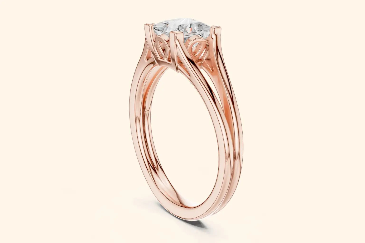A side view of a rose gold solitaire ring, showcasing the open, split-shank band and the ornate basket setting that holds the rectangular diamond.