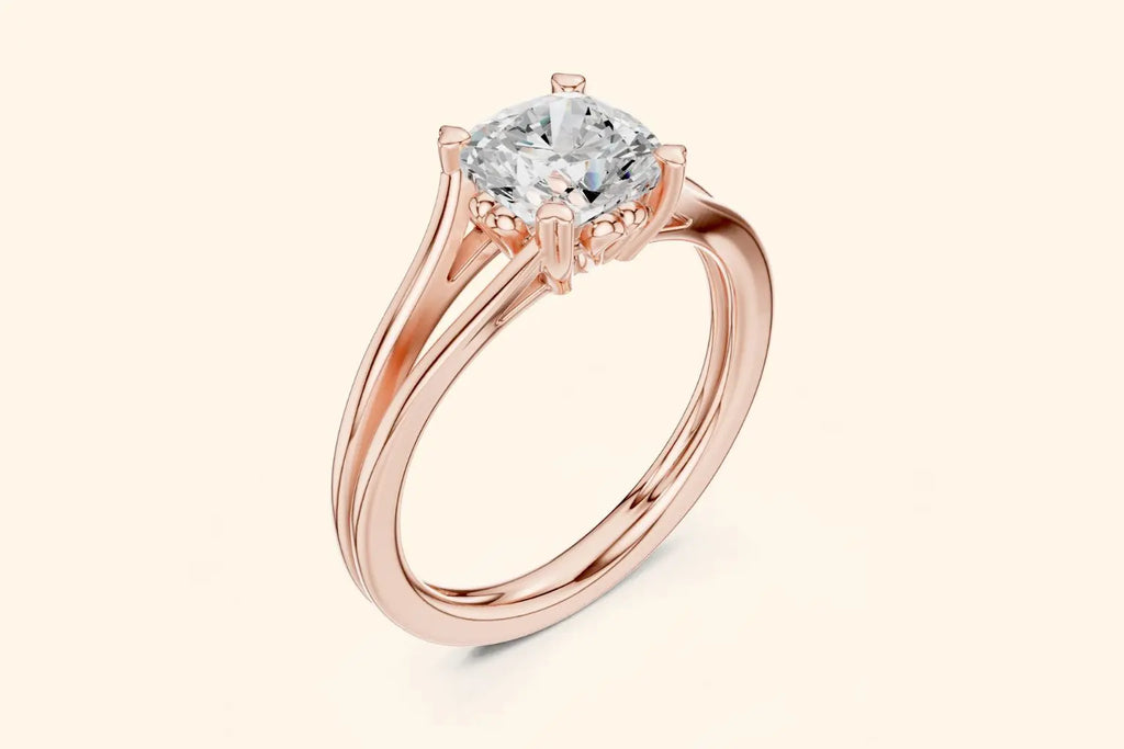 A three-quarter view of a rose gold solitaire ring, highlighting the cushion diamond, the ornate basket, and the modern split-shank band.
