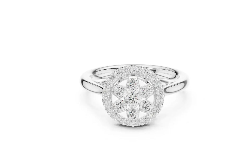 A bright silver ring featuring a large, oval-shaped setting. The center is a cluster of round diamonds arranged in a floral or star pattern, surrounded by a tight pave diamond halo. The highly polished band is sleek and simple.