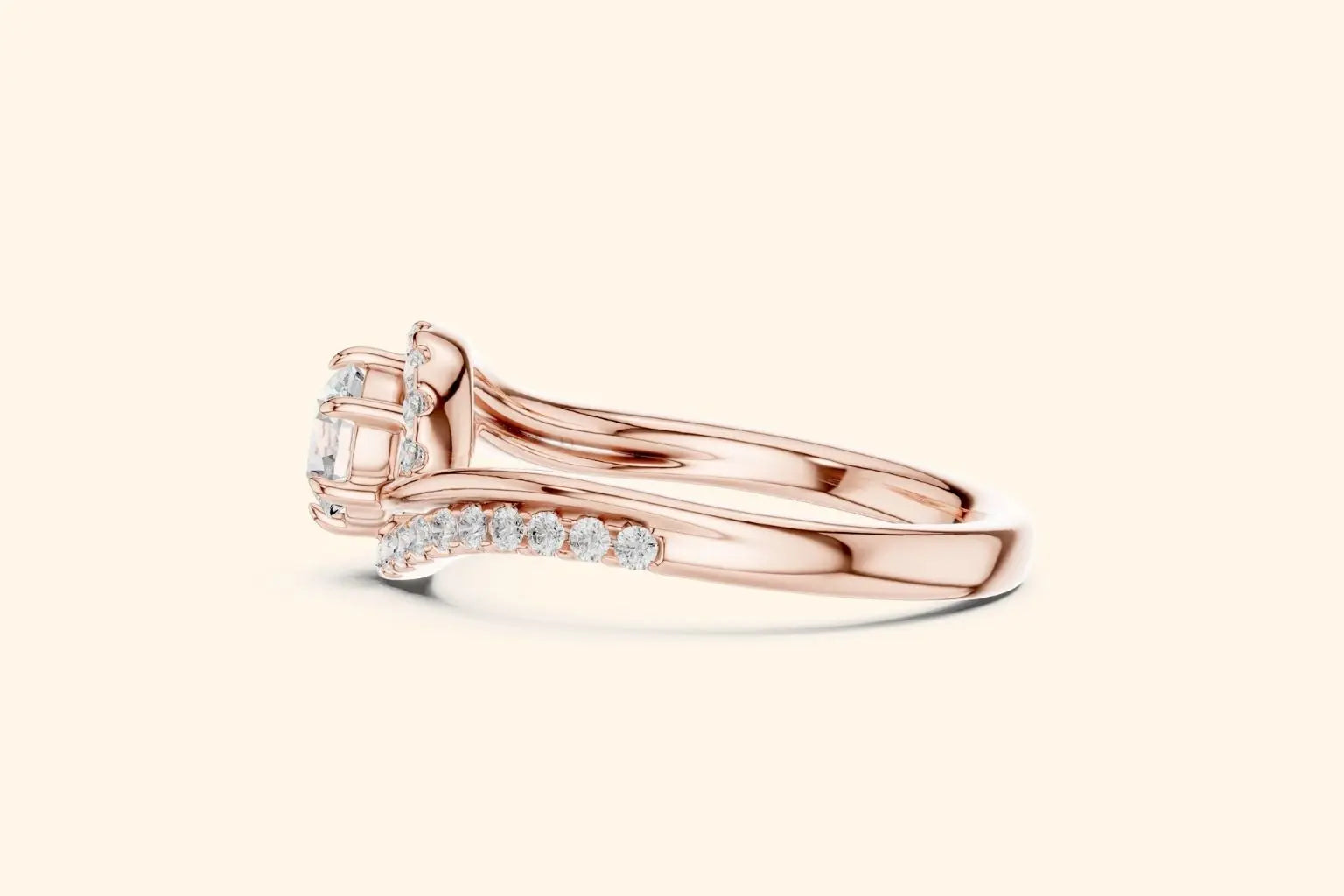 Elegant rose gold engagement ring with round diamond and ribbon-style setting 3