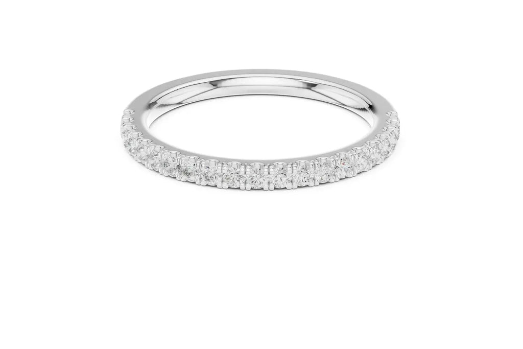 Silver ring with round-cut diamonds in a polished, elegant band design.