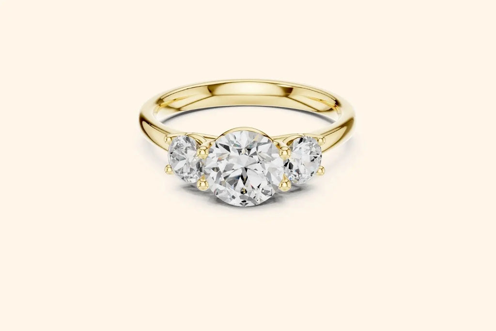 real gold three-stone ring