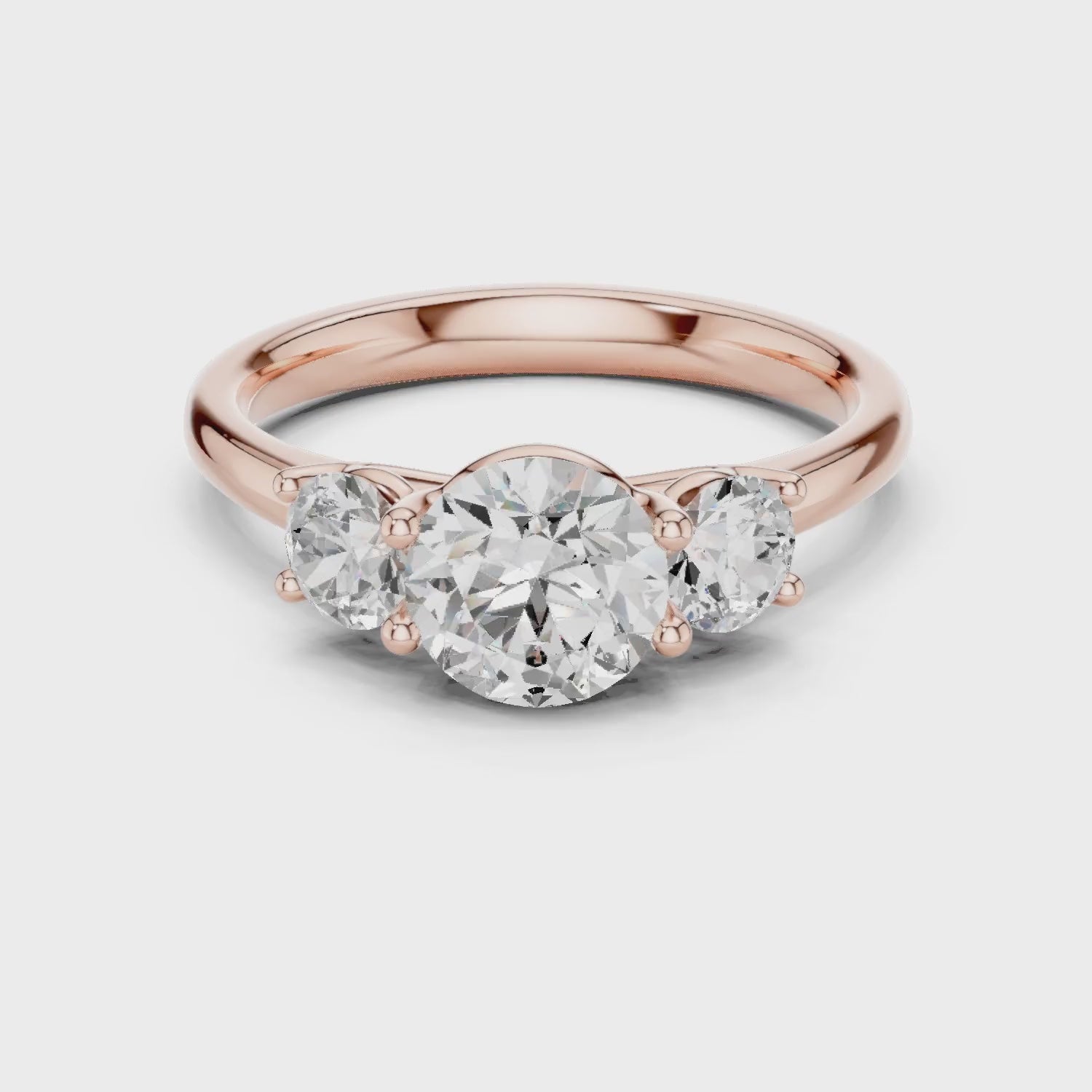 rose gold three-stone ring