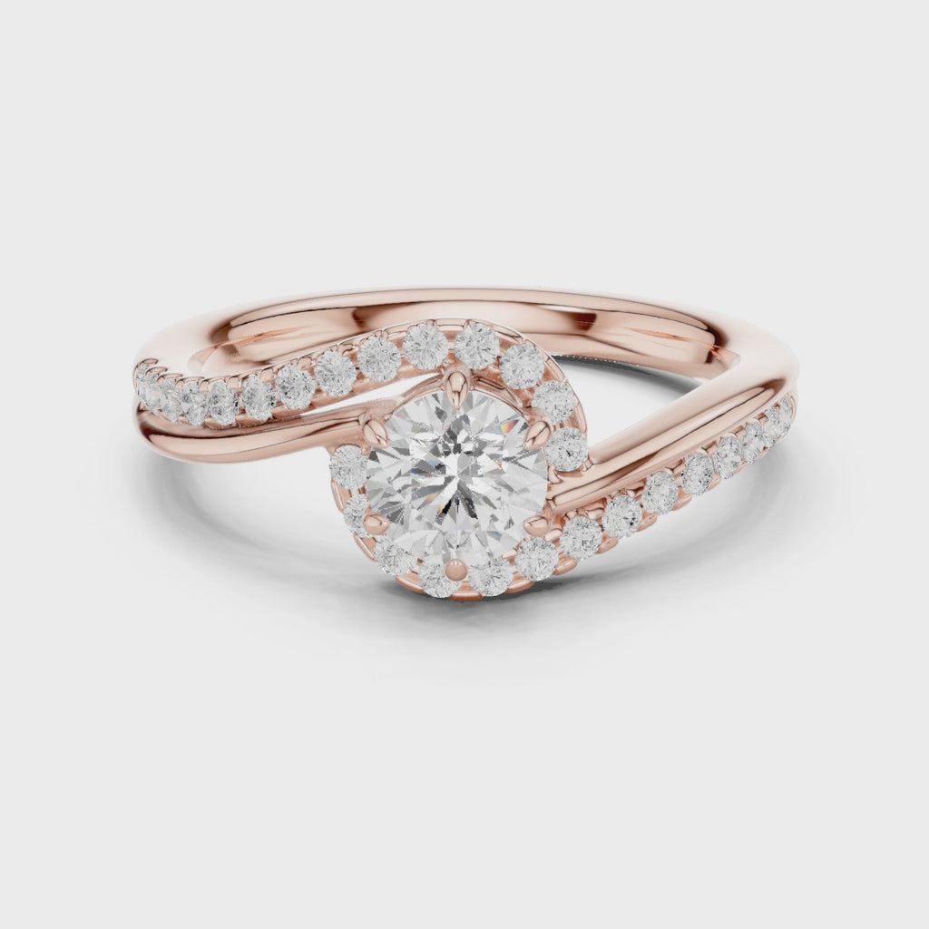 Elegant rose gold engagement ring with round diamond and ribbon-style setting