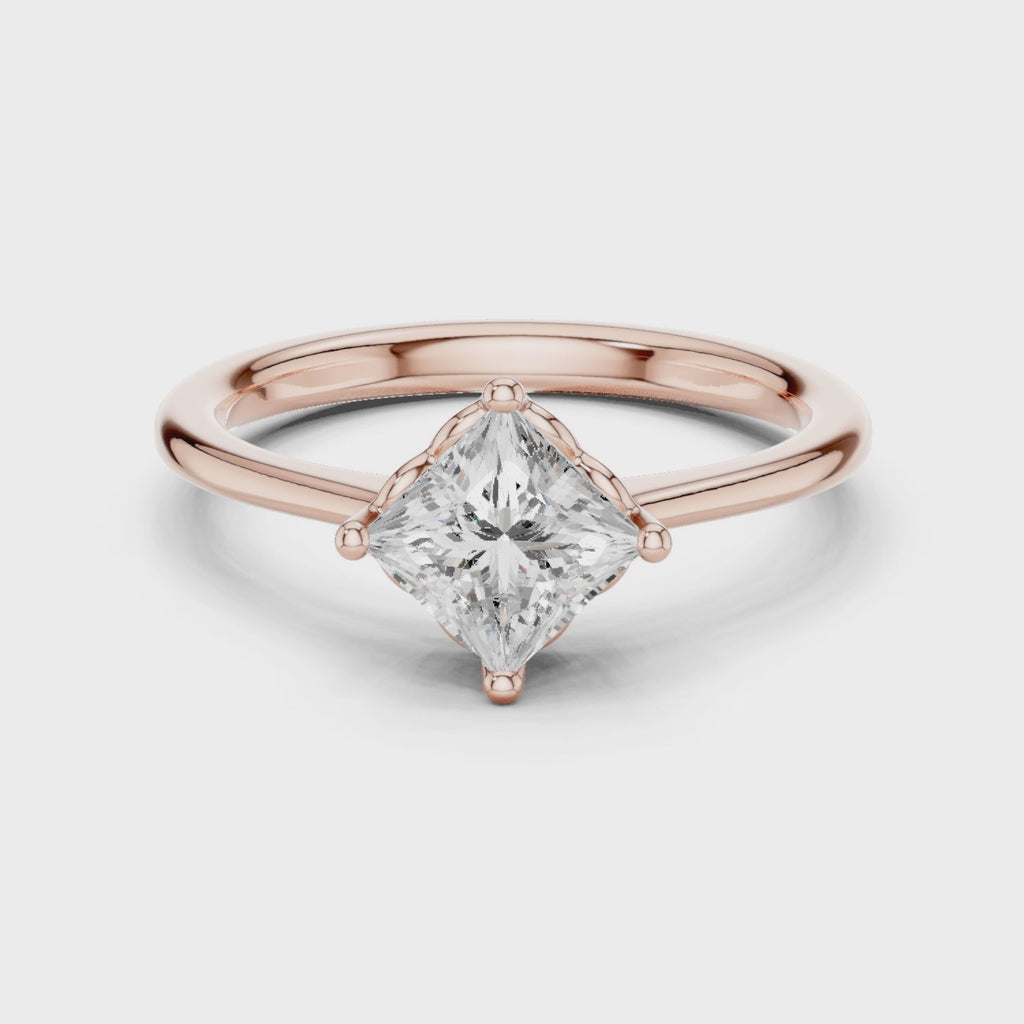 A Brilliant Princess-Cut Diamond Set in Gold