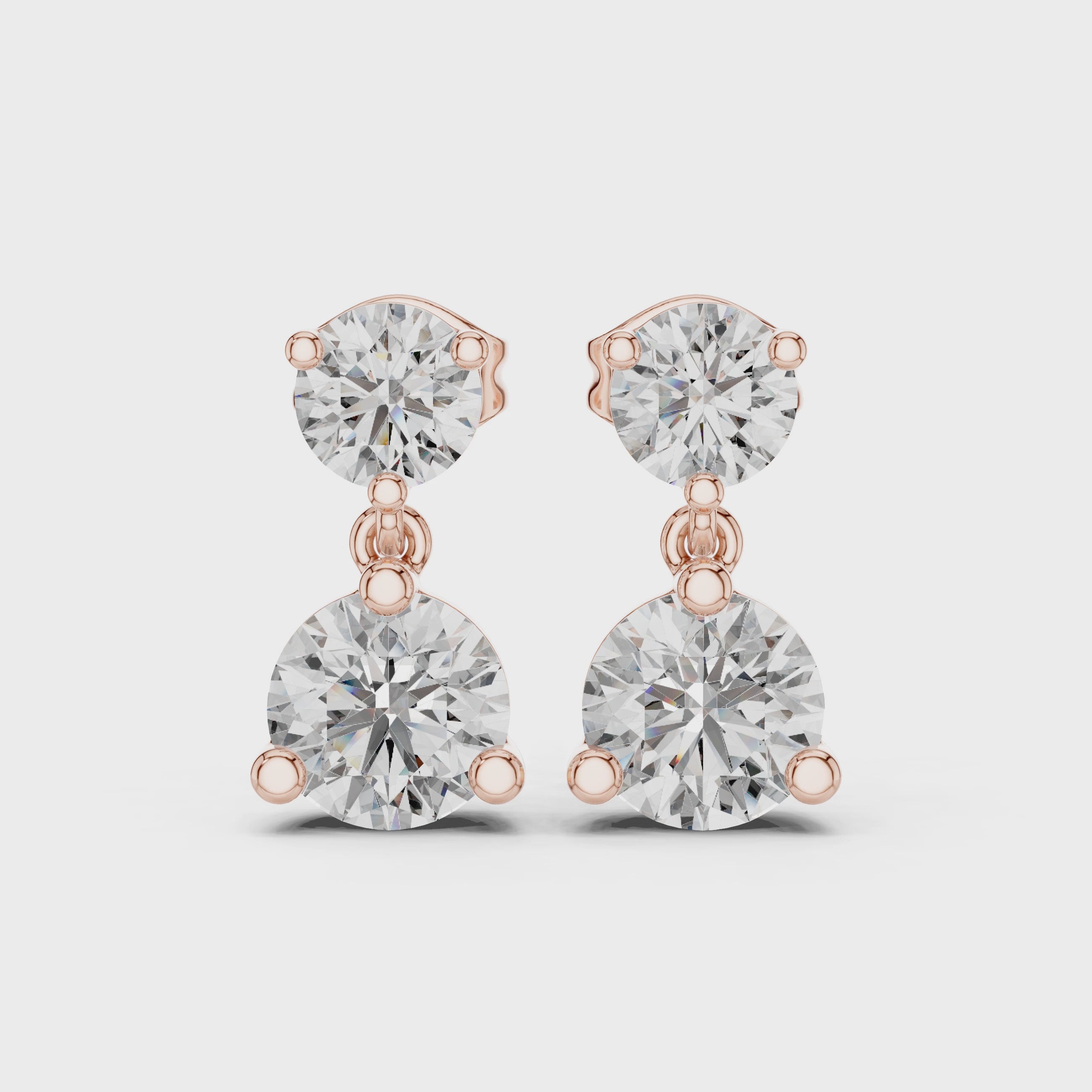 Two-stone diamond drop stud earrings