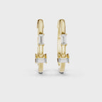 Pair of yellow gold hoop earrings with bar-set baguette diamonds and round diamond accents in a modern geometric design
