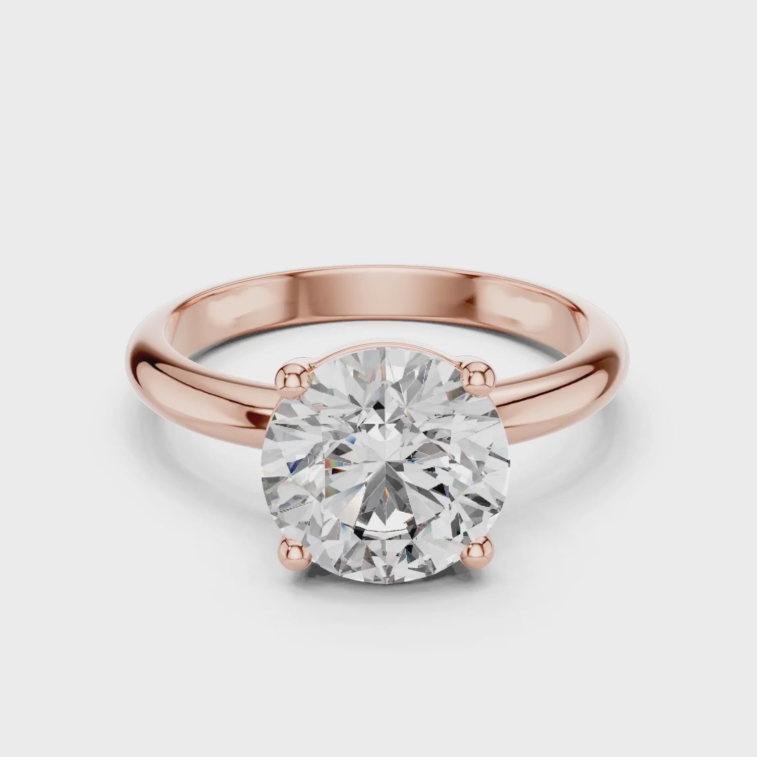 solitaire setting round brilliant-cut diamond ring